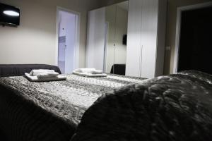 Postel nebo postele na pokoji v ubytování Affittacamere Sogni D'oro