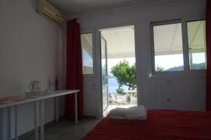 Postel nebo postele na pokoji v ubytování Hotel Rene