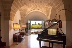 Φωτογραφία από το άλμπουμ του Villa Encantamiento - Dimora Gelsomino - Masseria Storica con piscina nel cuore della Puglia σε Latiano +73 φωτογραφίες