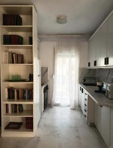Η κουζίνα ή μικρή κουζίνα στο Seaview Moments Aretsou +7 φωτογραφίες
