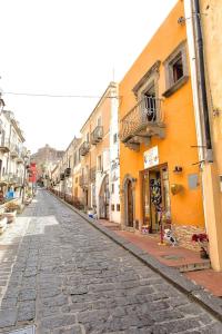 an empty street in a city with buildings at Il Veliero Blu Suite Lipari Centro - Corso Vittorio Emanuele in Lipari