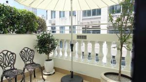 Balcone o terrazza di Vishan Garden Boutique Hotel 厦门维尚花园潮宿 中山路步行街店