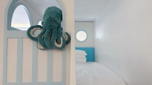 Letto o letti in una camera di Vishan Garden Boutique Hotel 厦门维尚花园潮宿 中山路步行街店