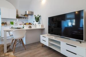A kitchen or kitchenette at H75 Apartments Kosice Centre