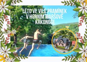 a picture of two people jumping into a swimming pool at Vila Pramínek, Krkonoše s bazénem kousek od Pece pod Sněžkou in Horní Maršov