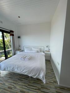 เตียงในห้องที่ Joy Houses +77 ภาพ