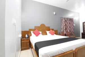 Letto o letti in una camera di Tn27callingkrishholiday