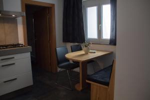 Kuchyň nebo kuchyňský kout v ubytování Ferienwohnung Götzis