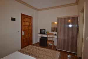 Postel nebo postele na pokoji v ubytování Hotel Konak Su