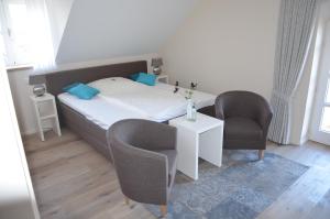 Postel nebo postele na pokoji v ubytování Hotel Josten