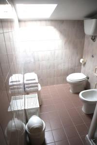 Koupelna v ubytování Hotel Astor