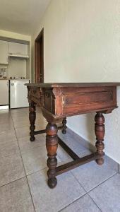 a wooden table in the middle of a kitchen at Villa Dimitra in Agios Dimitrios