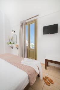Letto o letti in una camera di Aldea