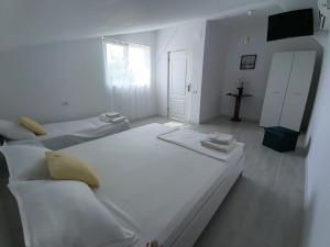 Postel nebo postele na pokoji v ubytování Casa AnaMaria