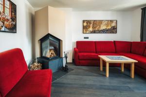 Posezení v ubytování Ferienresidenz Raich - Appartements mit Sky Wellness und Garten
