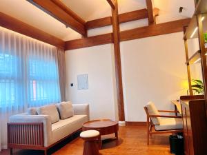 Posezení v ubytování Jingshan Garden Hotel