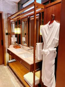 Koupelna v ubytování Jingshan Garden Hotel + 37 fotografií