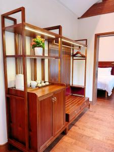 Postel nebo postele na pokoji v ubytování Jingshan Garden Hotel
