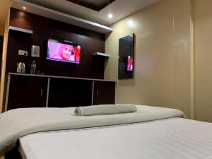 Postel nebo postele na pokoji v ubytování Hotel Sports Pvt Ltd