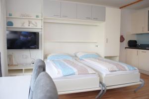 Postel nebo postele na pokoji v ubytování Haus Hanseatic, Wohnung 204