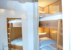 Postel nebo postele na pokoji v ubytování Haus Hanseatic, Wohnung 204
