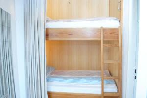 Postel nebo postele na pokoji v ubytování Haus Hanseatic, Wohnung 204 + 3 fotografie