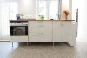 Kuchyň nebo kuchyňský kout v ubytování Appartement Reethus Koppelkiek + 13 fotografií