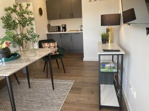 Kuchyň nebo kuchyňský kout v ubytování Stranddistel 4 + 22 fotografií