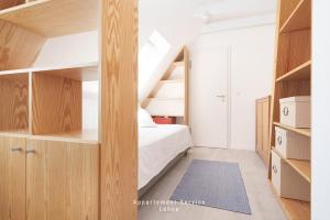 Postel nebo postele na pokoji v ubytování Ferienhaus Nord 54 GRAD