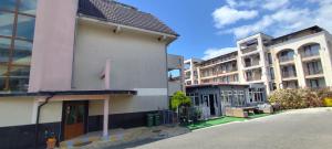 a group of buildings on a street at Aqua Studio - Sveti Vlas in Sveti Vlas +2 photos