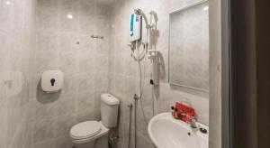 Koupelna v ubytování OYO 131 Dejaya Hotel Kota Damansara