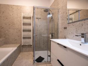 a bathroom with a shower and a sink at Traum-Ferienwohnung Mozart ! in Wilhelmshaven +109 photos