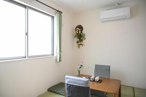 Φωτογραφία από το άλμπουμ του 大阪梅田淀川花民宿201套房 στην Οσάκα