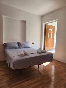 Postel nebo postele na pokoji v ubytování Guesthouse Te Lala
