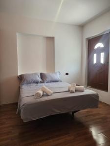Postel nebo postele na pokoji v ubytování Guesthouse Te Lala
