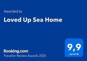 Certifikát, ocenenie alebo iný dokument vystavený v ubytovaní Loved Up Sea Home
