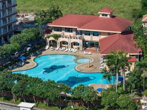 an aerial view of a resort with a swimming pool at Jomtien Beach Condominium S1 by Olga in Jomtien Beach