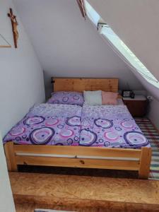 Postel nebo postele na pokoji v ubytování Apartmány Anička vo Važci