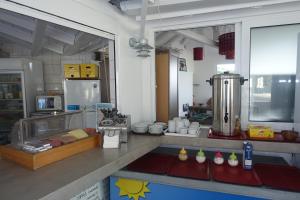 Kuchyň nebo kuchyňský kout v ubytování Hotel Rene