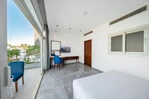 Postel nebo postele na pokoji v ubytování Porto Sokhna Beach Resort