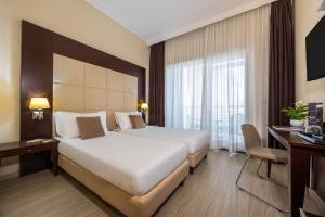 TV a/nebo společenská místnost v ubytování iH Hotels Milano Watt 13