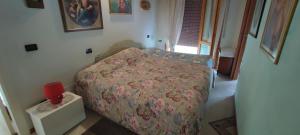 Ένα ή περισσότερα κρεβάτια σε δωμάτιο στο Casa Anna