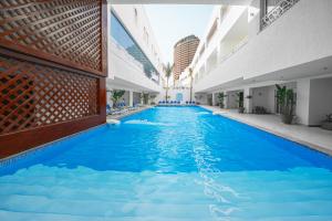 Bazén v ubytování Porto Sokhna Beach Resort nebo v jeho okolí