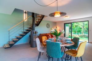 Posezení v ubytování Le Lodge de Sainte-Anne - Cadre bucolique