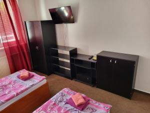 Postel nebo postele na pokoji v ubytování Hotel Hokejka