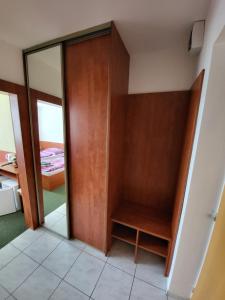 Postel nebo postele na pokoji v ubytování Hotel Hokejka