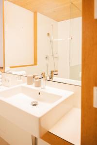 Koupelna v ubytování Aparthotel Hubertus Mellau