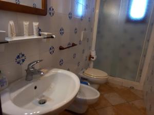 Koupelna v ubytování BOTTE - Appartementi Il Palmento