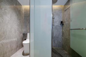 Koupelna v ubytování Huandong Manyi Hotel