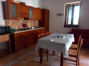 Kuchyň nebo kuchyňský kout v ubytování BOTTE - Appartementi Il Palmento + 4 fotografie